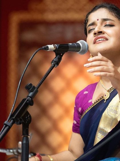 An emotive close-up, capturing the feeling and passion I pour into every note. This is the essence of 'bhava' or emotional expression in Carnatic music.