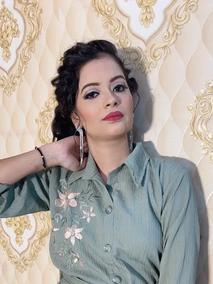 Another angle of the modern party look, showing how the hairstyle and makeup work together to create a youthful and stylish appearance.