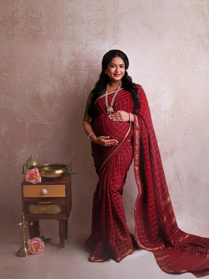 There is a special kind of magic in a traditional maternity shoot. This gorgeous mother-to-be in a rich red pattu saree is the perfect example of grace and cultural elegance. I love capturing the richness of our heritage in these precious moments.
