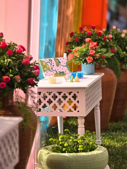 Another view of the art-themed console table, showing how we use color and objects to build a narrative and create an immersive experience.