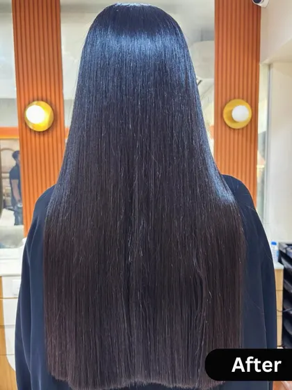 This is the incredible result of my Nanoplastia straightening treatment. Her hair is now glass-like, incredibly smooth, and reflects light beautifully. This service provides a sleek, frizz-free finish without the use of harsh chemicals, focusing on deep hair repair.