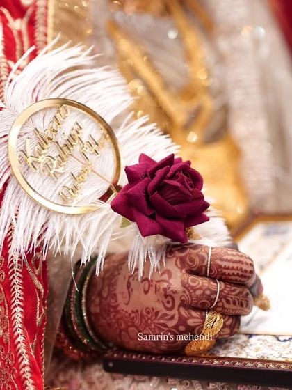 The moment she says "Qubool Hai," with her beautifully stained hand. The deep color of the mehendi adds to the richness of this unforgettable moment.