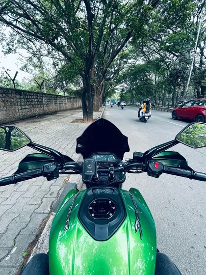 The view from the saddle of our Dominar, ready to navigate the green streets of Bangalore.