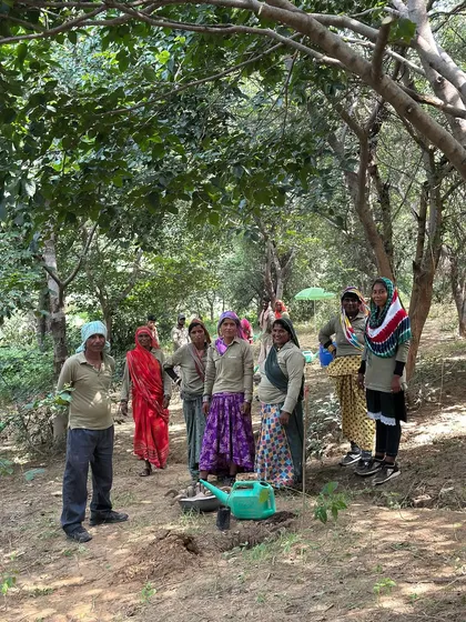 Our dedicated on-ground team at Ghata Bundh, standing in the middle of the restored landscape. Their tireless work is the backbone of all our eco-restoration projects.