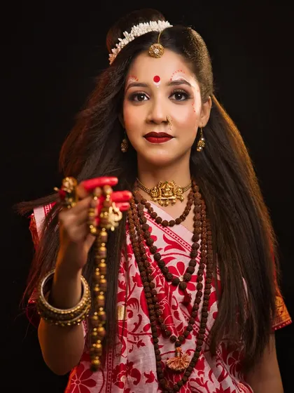 A serene depiction of Maa Brahmacharini, the second form of Durga, who represents penance and knowledge.