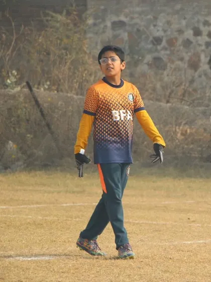 This is Yajur, who discovered his natural talent for goalkeeping at our academy. He initially disliked the position but embraced the challenge to become Goalkeeper of the Tournament.