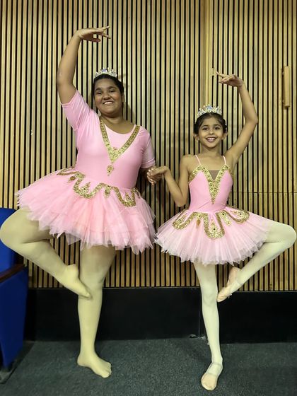 A performance photo showing the grace and partnership between our dancers. These are the skills that get noticed by top ballet schools.