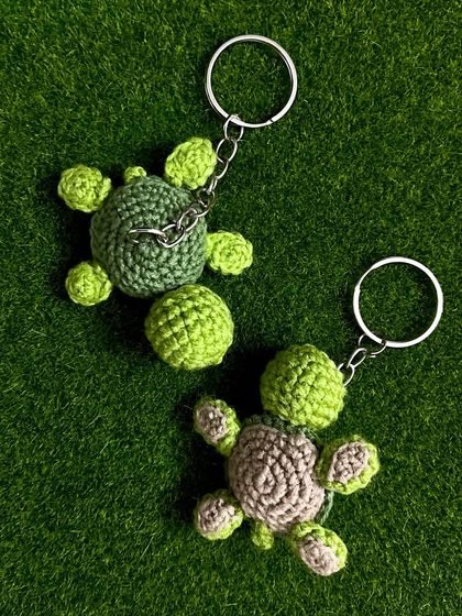 I also offer color variations for my turtle keychains. This one features a light brown shell, showing how you can customize your little friend.