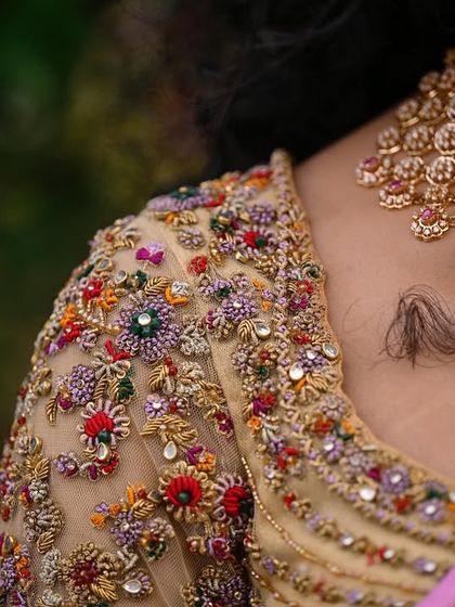 A collection of detailed shots focusing on the diverse and intricate embroidery of my custom blouses. These images highlight the fine craftsmanship, luxurious materials, and unique designs that define my work.