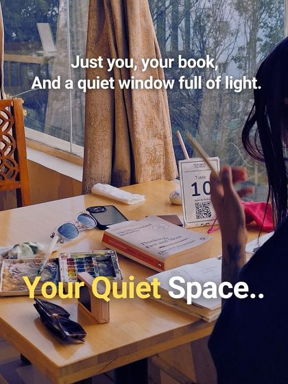 Create your own quiet sanctuary. This table by the window is perfect for spreading out your book, art supplies, and ideas, giving you a personal space to think and create.