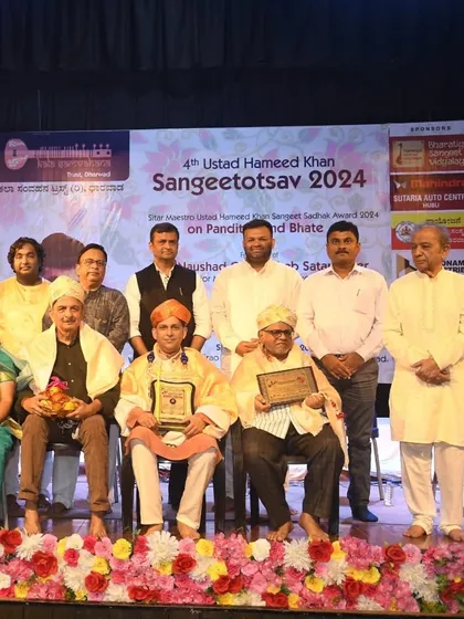 Our family's work was recognized at the 4th Ustad Hameed Khan Sangeetotsav in Dharwad. Here, my senior, Naushad Gulab saheb Sitarmaker, is being felicitated for his lifelong contribution to making musical instruments.