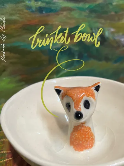 Meet one of my little animal friends. I create these whimsical trinket bowls to hold your tiny treasures. This one features a hand-sculpted fox, ready to keep your rings and earrings safe. It's a small piece of functional art to bring a little joy to your dresser.