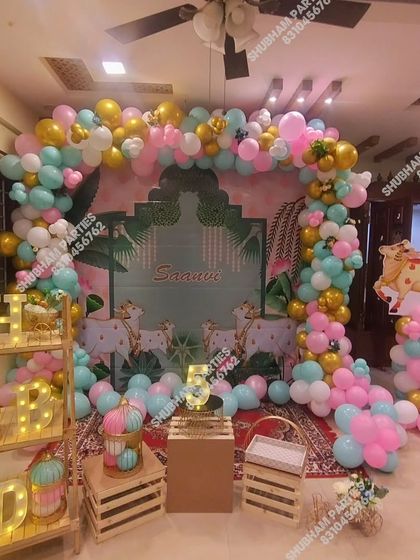 A full view of the Pichwai themed decoration, showing the complete setup with props and marquee letters.