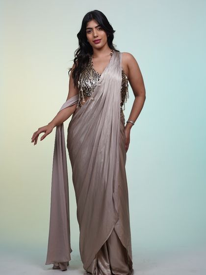 Another angle of the metallic pre-draped saree, showing off its unique and glamorous style.