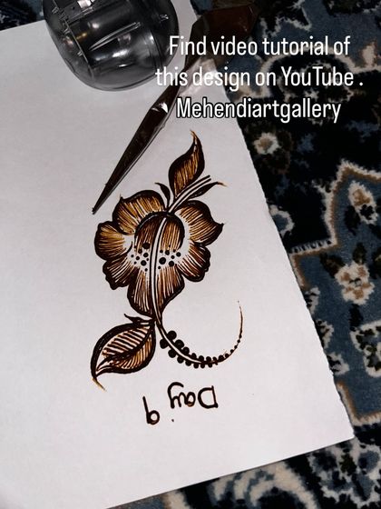 A still shot of the Day 9 floral design. This allows you to study the line work, shading, and dot accents up close. Full video tutorials are available for my students on YouTube.