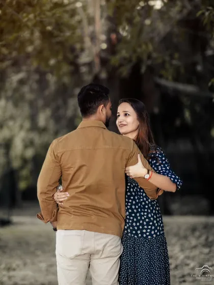 Capturing the unscripted, in-between moments is what we love most. Here, a candid embrace during a walk in the park tells a story of comfort and affection, showcasing the genuine connection that makes each pre-wedding journey unique.