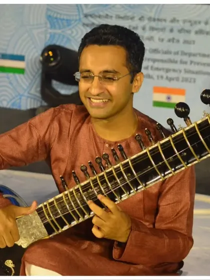 A smiling moment captured during my performance for international delegates. I ensure my presentation is always professional and engaging.