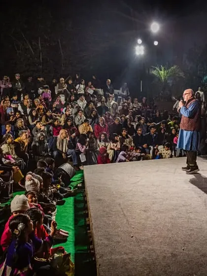 Our founder addressing a captivated audience at the end of a show. We believe in connecting with our community and sharing the passion behind our work.