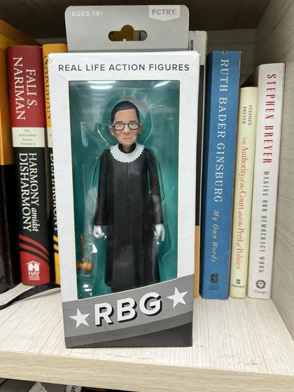 My RBG action figure, standing proudly on my bookshelf. She was a real-life hero whose work continues to inspire lawyers and advocates around the world.