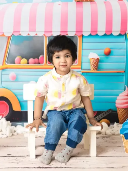 The ice cream truck theme is a hit with older kids too. These photos capture the pure happiness and excitement of a summer day treat.