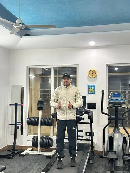 Thumbs up on the treadmill.