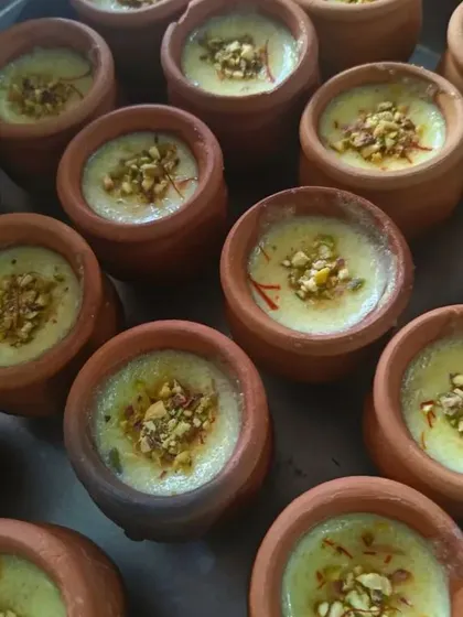 To end your meal on a sweet note, we present our traditional Matka Firni. This creamy rice pudding is delicately flavored with saffron and cardamom, served in earthy clay pots.