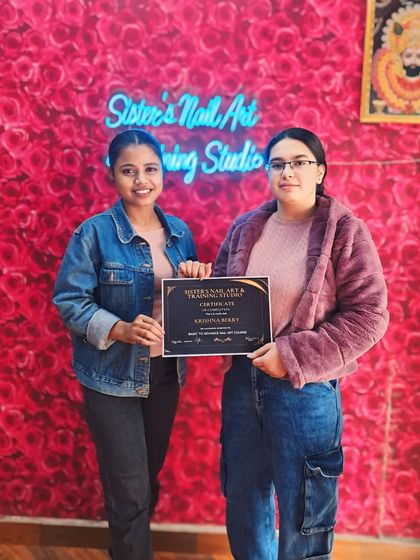 Karishna proudly displays her certificate after finishing the Basic to Advance Nail Art Course. We are confident she will do great work.