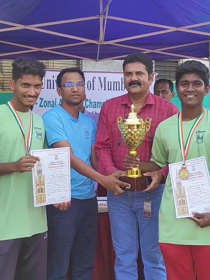 A team trophy from the University of Mumbai championship. This represents the collective effort and spirit of our archers.