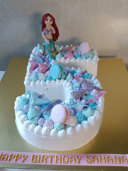 Creating custom cakes like this 'fintastic' mermaid-themed number five cake for a little girl's birthday brings me so much joy. I love bringing a client's vision to life with detailed, handcrafted decorations.