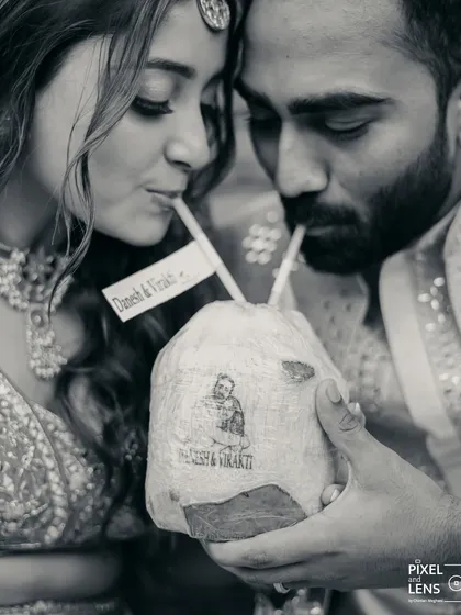 It's the small, personal touches that make a wedding truly yours. We arranged for custom-stamped coconuts featuring the couple's caricature, offering a refreshing and memorable welcome drink for guests at this beautiful outdoor ceremony.