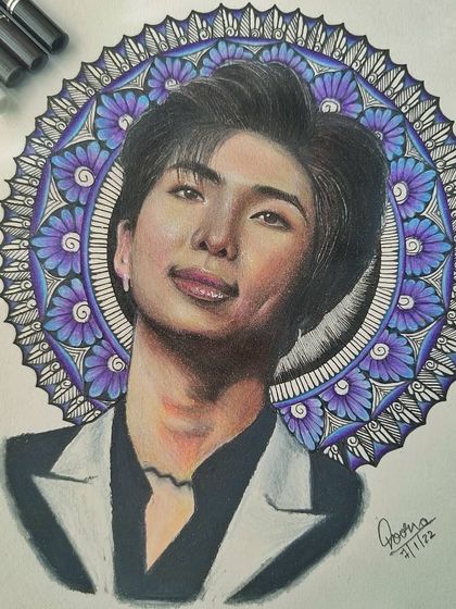 A colored pencil portrait of Kim Namjoon from BTS, set against a custom purple mandala background. This piece combines my love for realism and decorative patterns.