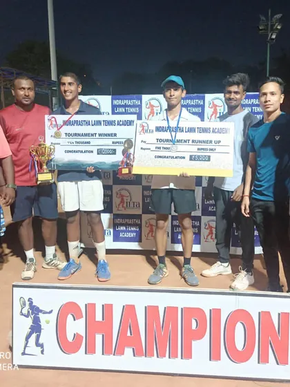 The coaching team stands with the winner and runner up of a recent prize money championship. We believe in celebrating these victories as a team, acknowledging the hard work from both the players and their mentors.
