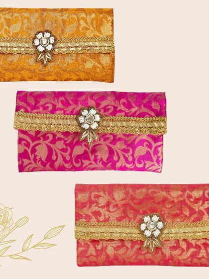 These brocade cash envelopes come in a range of rich, jewel-toned colors. The traditional fabric is elevated with a beautiful, sparkling centerpiece.