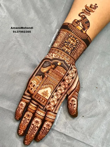 A full hand design with a palace facade on the palm. The wrist features a playful elephant balancing a pot, adding a touch of whimsy to the traditional design.