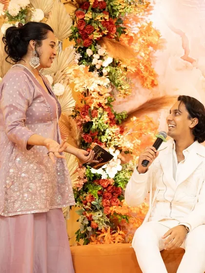 Handing over the mic to the father-to-be. I encourage participation from everyone to make the celebration truly about the family and their story.