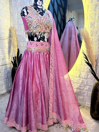 The full set, including the lehenga, blouse, and dupatta. A complete, show-stopping outfit for any celebration.