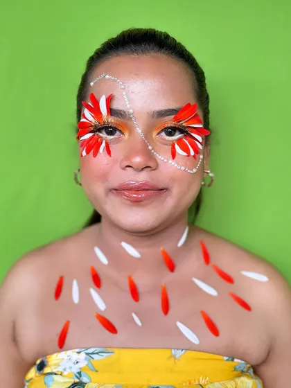 This stunning creative makeup look, using flower petals and gems, was designed by our student Nikita. Our courses encourage students to push their creative boundaries and develop their unique artistic voice.