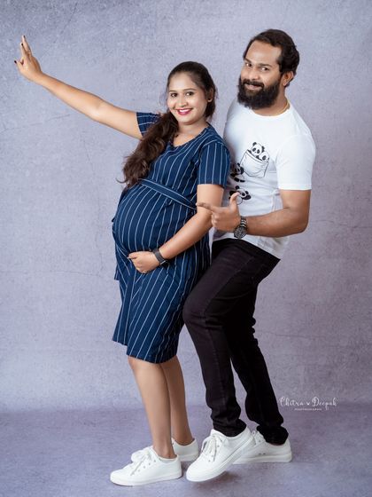 A fun and energetic pose from this happy couple. Their playful vibe is contagious and makes for great, natural photos.