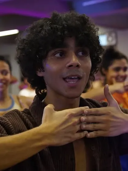 A close-up of the instructor, fully engaged with his students.