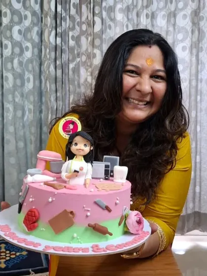 Another happy moment with my 10th-anniversary cake. This cake represents a decade of passion, growth, and the incredible support system that has been with me every step of the way.