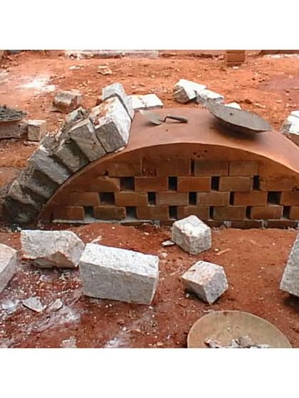 The construction of a vaulted roof using hollow bricks and a temporary steel formwork. This technique, used in the Professor's Residence, is structurally efficient and creates beautiful, thermally comfortable interior spaces.