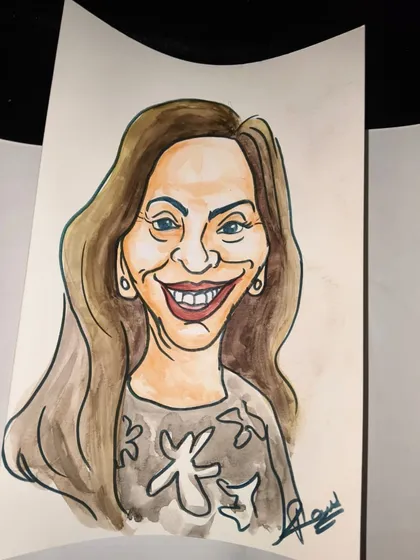 A beautifully done caricature portrait of a female guest, highlighting the artist's ability to capture personality in their work.
