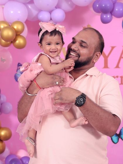 A magical 'Mermaid' themed birthday party, with shimmering blue and green decor, seashell props, and mermaid cutouts, creating an enchanting underwater world.