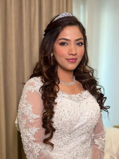 A close-up of the Christian bride's makeup. The look is elegant and sophisticated, with a focus on her beautiful eyes.