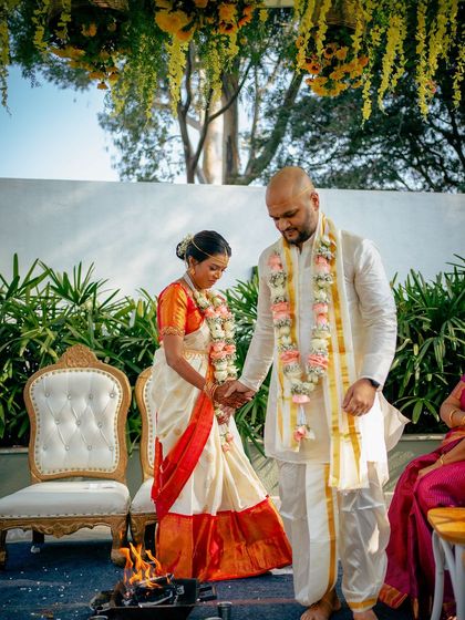 I have had the honor of hosting many beautiful South Indian weddings. The lush greenery and traditional decor elements, like floral arrangements and brass lamps, create an authentic and sacred atmosphere for the ceremony.