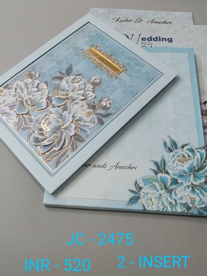 This premium invitation features a frame filled with 3D blue peonies, accented with gold foil. The design is both bold and beautiful, ideal for making a memorable first impression.