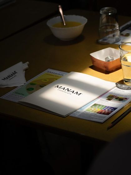 The scene at our Chocolate Profiling Workshop, with tasting notes and materials ready for the session. The sunlight filtering into our glasshouse creates the perfect, relaxed ambiance for a day of learning.