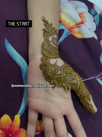 The start of a simple yet elegant design, focusing on a single finger and the back of the hand.