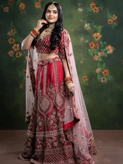 A full-length view of the North Indian bridal lehenga and the radiant makeup.