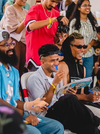 The crowd and judges enjoying the vibe at Spectra 2023. The community energy is a huge part of our events.